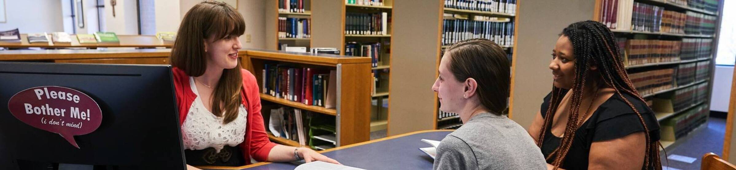 A librarian helps students2
