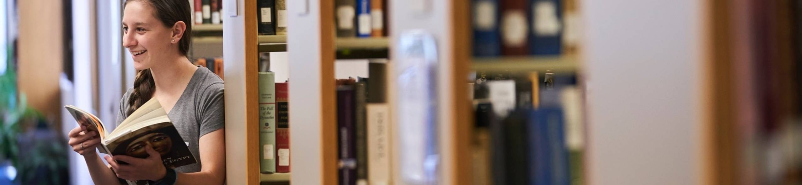 Ursuline college student in library