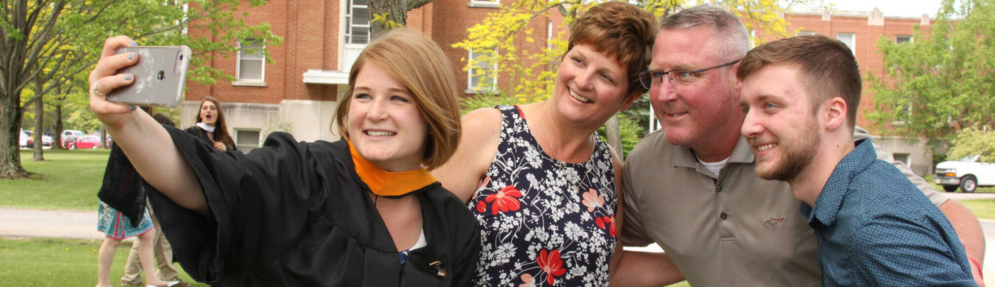 Ursuline college students graduation day with parents3