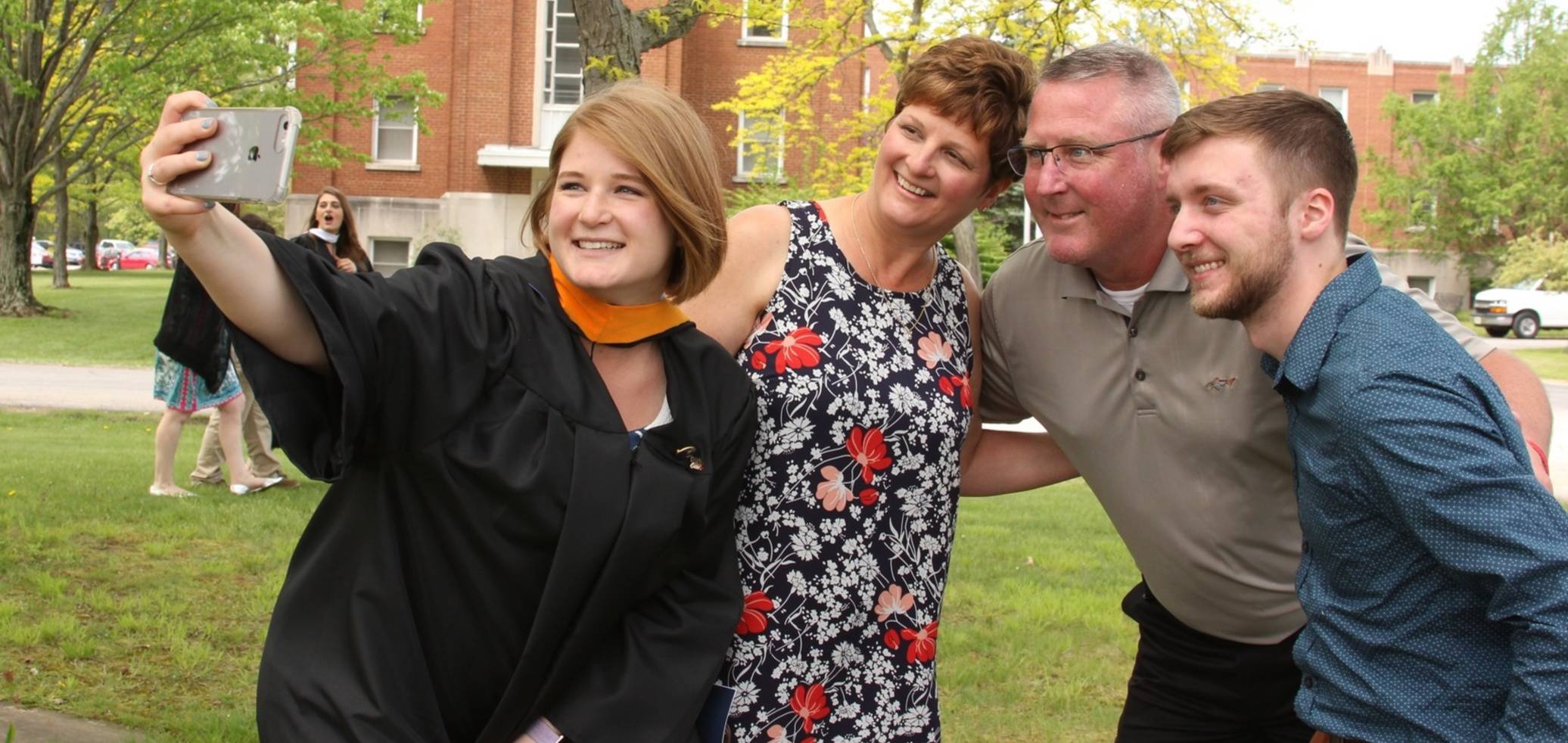 Ursuline college woman taking selfie at graduation3